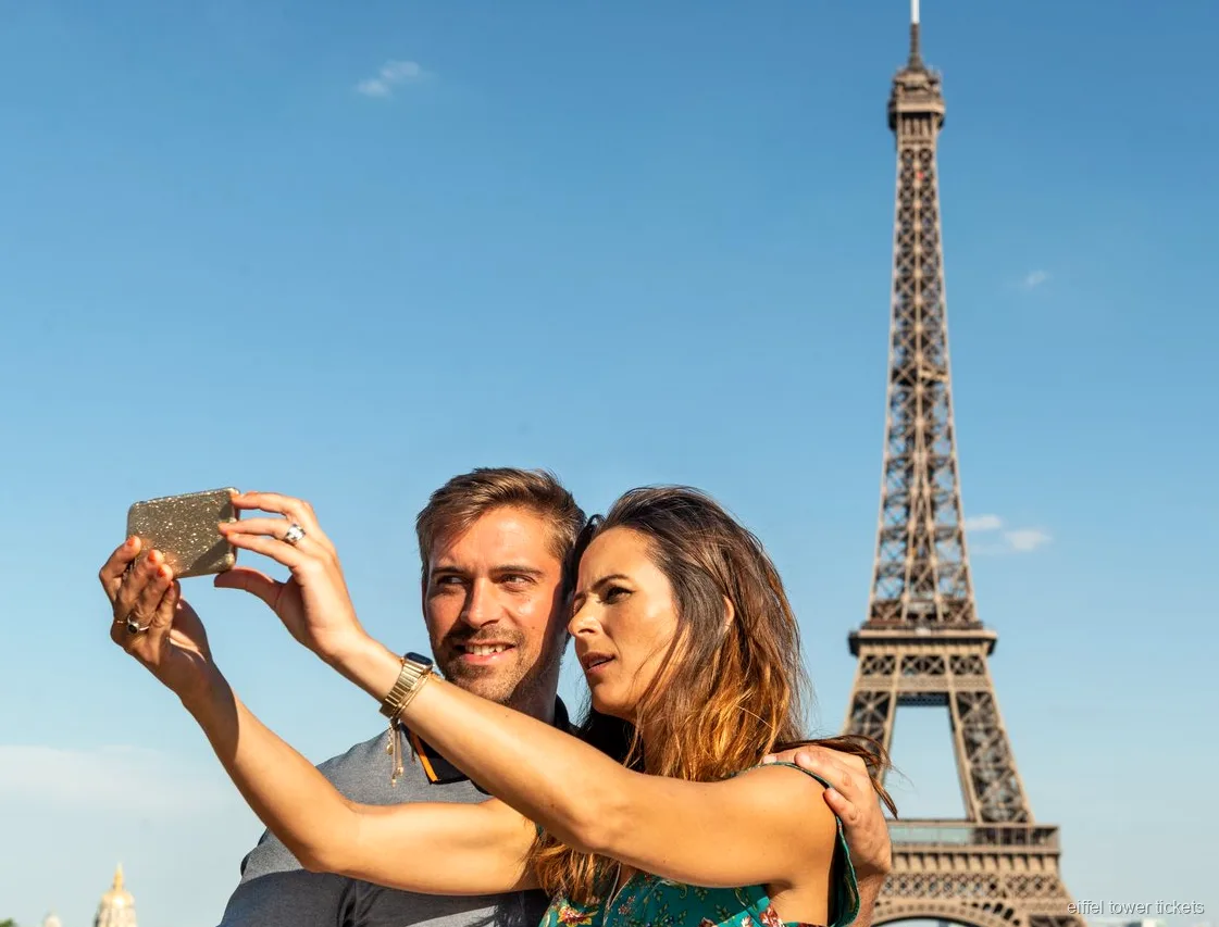 Eiffel Tower ticket holders looking out over the Seine