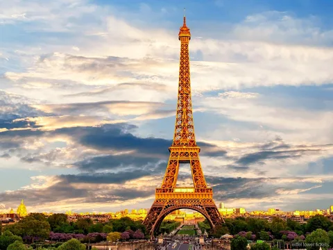 Eiffel Tower elevator tickets: visitors heading up to the second floor